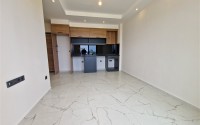Compact new apartment with high-quality finishing 1800 meters from the sea, in the Mahmutlar area-id-7630-photo-2