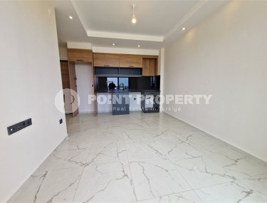 Compact new apartment with high-quality finishing 1800 meters from the sea, in the Mahmutlar area-id-7630-photo-2