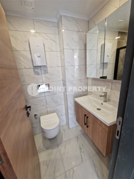 Compact new apartment with high-quality finishing 1800 meters from the sea, in the Mahmutlar area-id-7630-photo-7