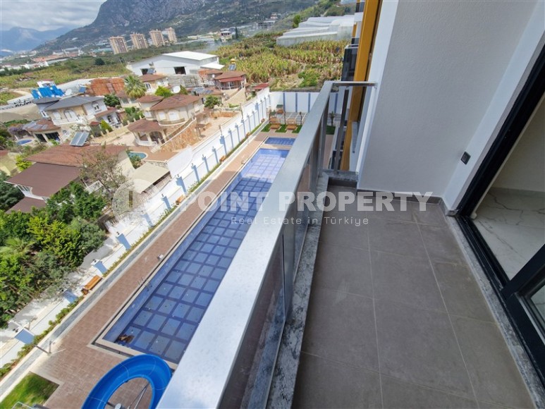 Compact new apartment with high-quality finishing 1800 meters from the sea, in the Mahmutlar area-id-7630-photo-9