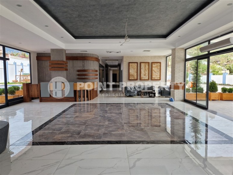 Compact new apartment with high-quality finishing 1800 meters from the sea, in the Mahmutlar area-id-7630-photo-17