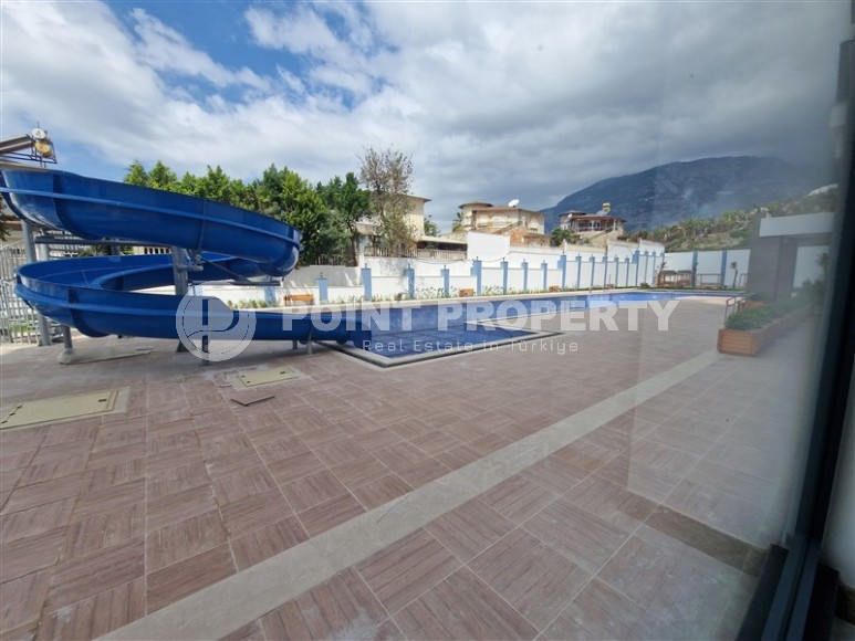 Compact new apartment with high-quality finishing 1800 meters from the sea, in the Mahmutlar area-id-7630-photo-18