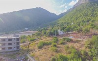 Plot of land for the construction of a villa or townhouse in a green, ecologically clean area of Alanya - Upper Oba-id-7635-photo-3