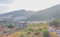 Plot of land for the construction of a villa or townhouse in a green, ecologically clean area of Alanya - Upper Oba-id-7635-photo-7