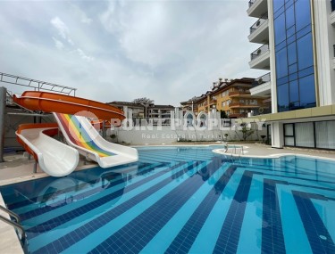 New apartment with fine finishing 800 meters from the sea, in the center of Alanya-id-7542-photo-1