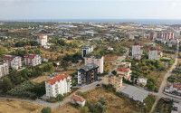 Great prices: apartments from 1+1 to 4+1 in a project under construction in Avsallar, Alanya-id-1590-photo-2