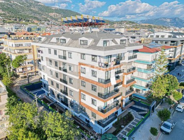 Finished apartment on the 2nd floor in a residence built in 2023, in a modern area of central Alanya - Güller Pinari-id-7658-photo-1