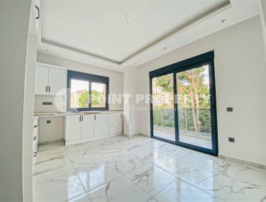 Квартира с чистовой отделкой на 2-м этаже в резиденции 2023 года постройки, в современном районе центральной части Аланьи - Гюллер Пынары-id-7658-фото-2