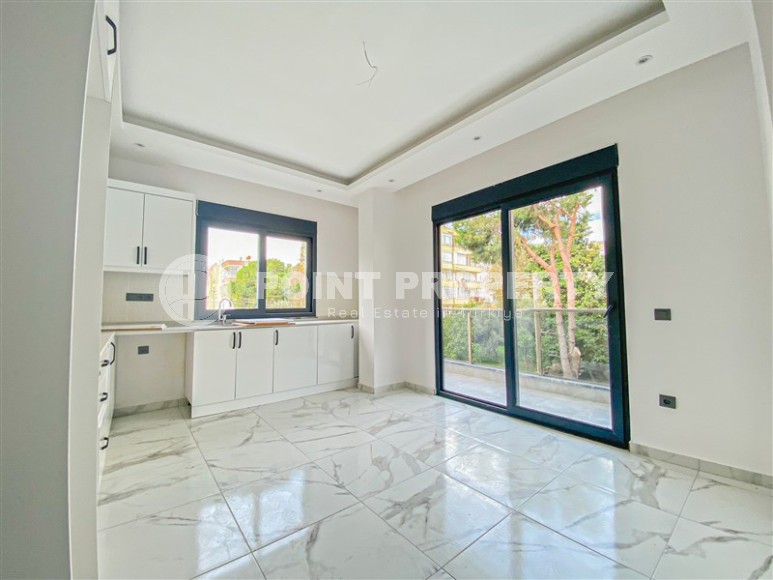 Квартира с чистовой отделкой на 2-м этаже в резиденции 2023 года постройки, в современном районе центральной части Аланьи - Гюллер Пынары-id-7658-фото-2