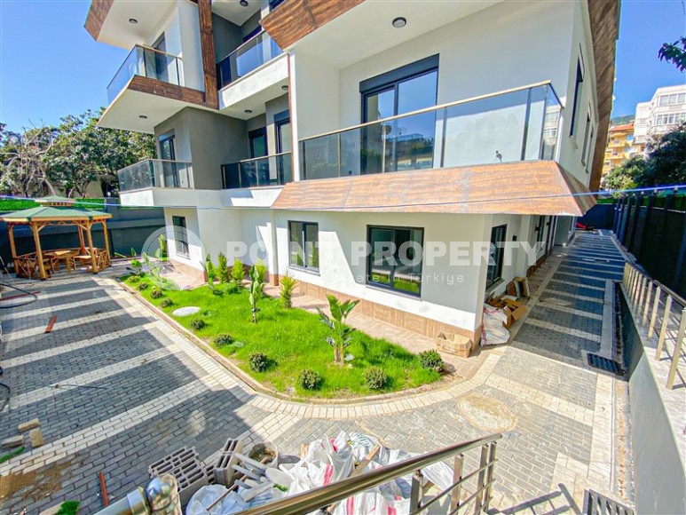 Квартира с чистовой отделкой на 2-м этаже в резиденции 2023 года постройки, в современном районе центральной части Аланьи - Гюллер Пынары-id-7658-фото-18