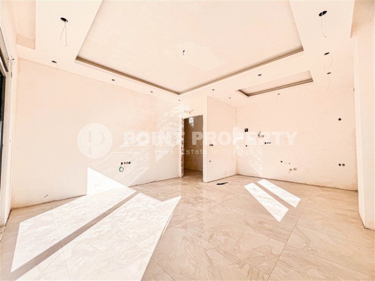 Apartment 2+1, with a total area of 95 m2, 600 meters from the sea, in the picturesque area of Alanya - Avsallar.-id-7660-photo-2