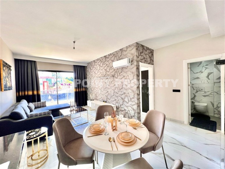 Современная квартира 1+1 в 1700 метрах от моря, в престижном районе Аланьи - Каргыджак-id-7663-фото-2