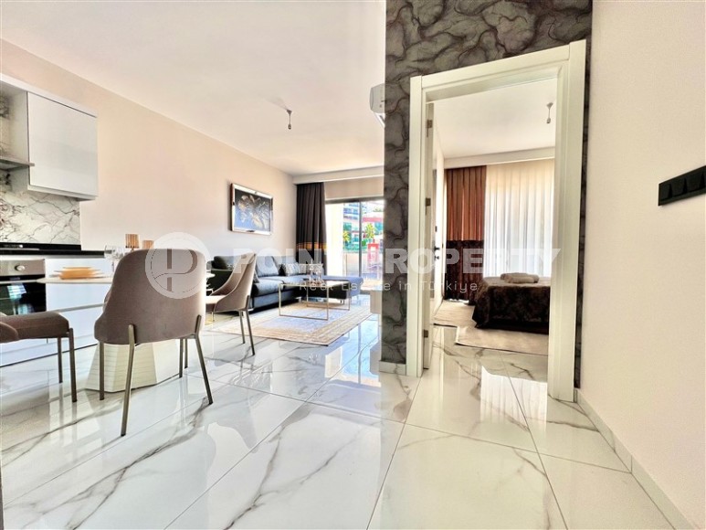 Современная квартира 1+1 в 1700 метрах от моря, в престижном районе Аланьи - Каргыджак-id-7663-фото-5