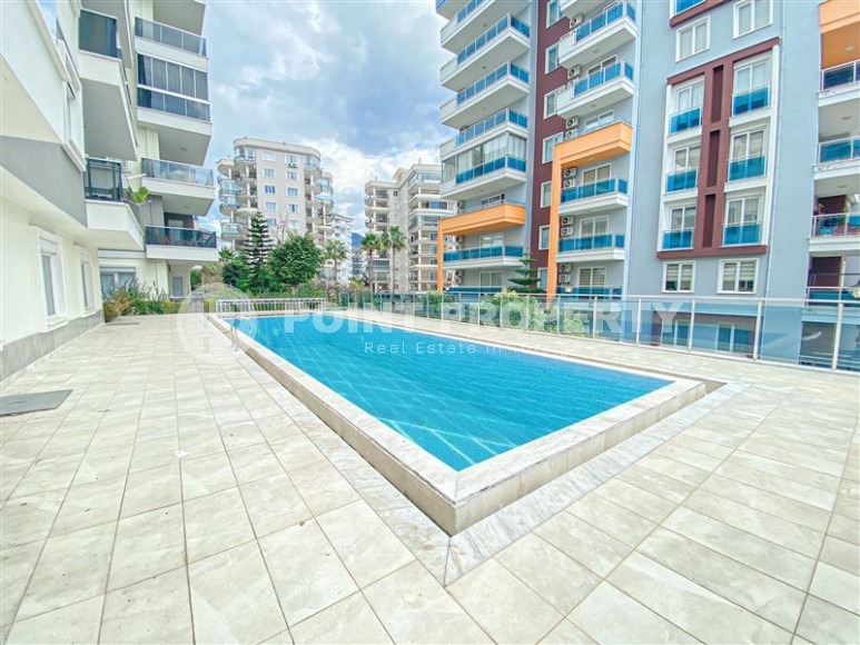 Стильная квартира с современным дизайном и приятным светлым интерьером, в центре района Тосмур-id-7665-фото-15