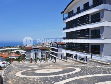 View apartments 2+1 and 3+1 in a large complex from a famous developer, Kargicak-id-1085-photo-4