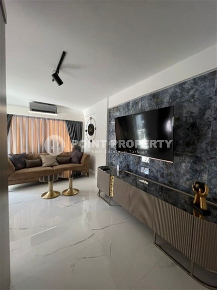 Стильная квартира с дизайнерским ремонтом в 100 метрах от знаменитого пляжа Клеопатры, в центре Аланьи-id-7679-фото-4