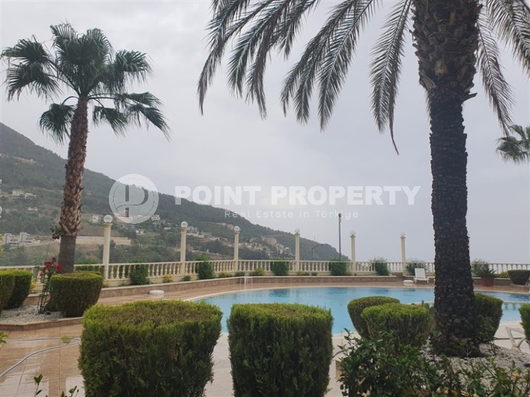 Современная квартира 2+1 с собственным садом, в престижном районе Аланьи - Тепе-id-7682-фото-25