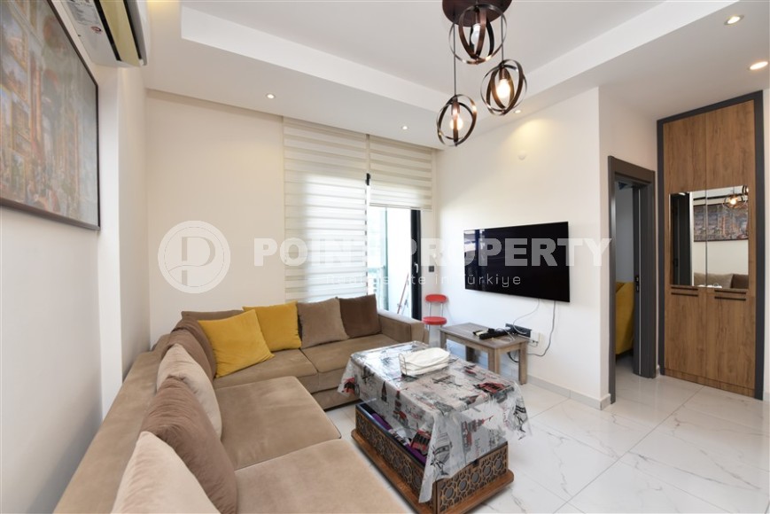 Современная квартира 1+1, общей площадью 50 м2, на 1-м этаже в новом жилом комплексе с отельной инфраструктурой-id-7690-фото-2