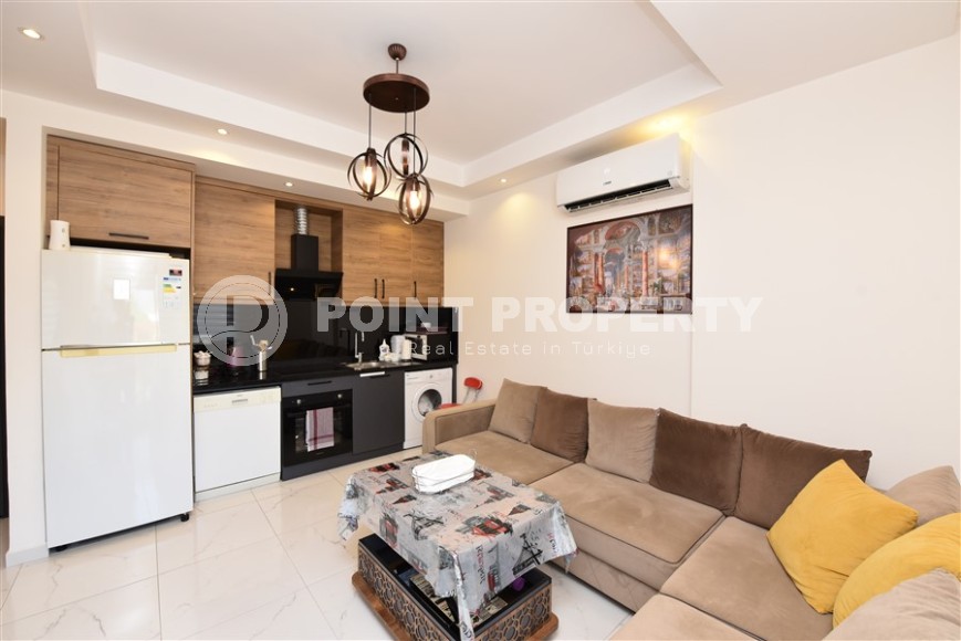 Современная квартира 1+1, общей площадью 50 м2, на 1-м этаже в новом жилом комплексе с отельной инфраструктурой-id-7690-фото-3