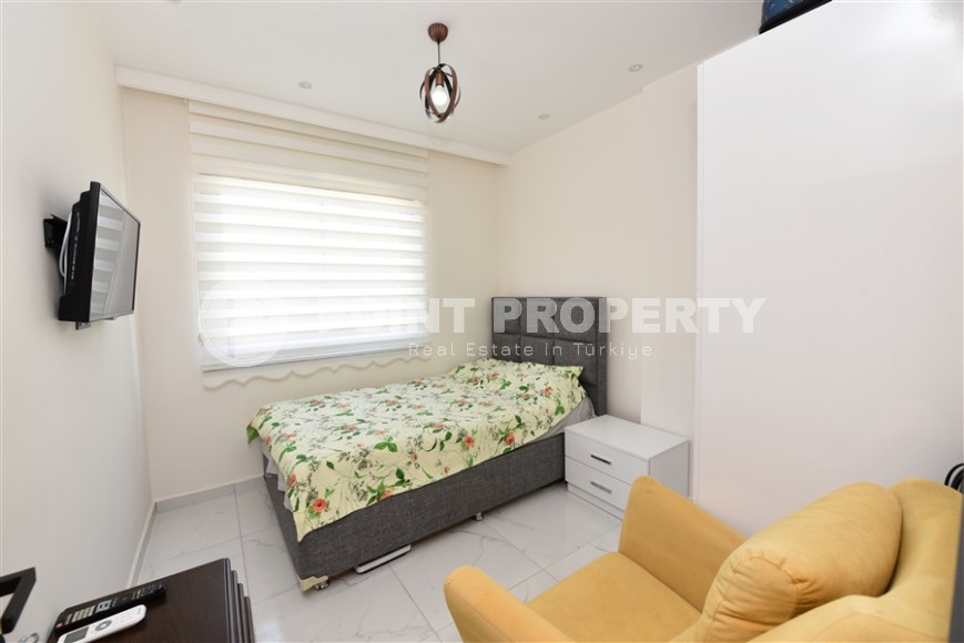 Современная квартира 1+1, общей площадью 50 м2, на 1-м этаже в новом жилом комплексе с отельной инфраструктурой-id-7690-фото-4