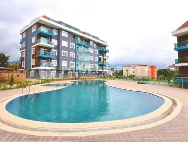 Apartment 1+1 with access to a spacious lawn, in a promising area of Alanya - Upper Oba-id-7692-photo-1