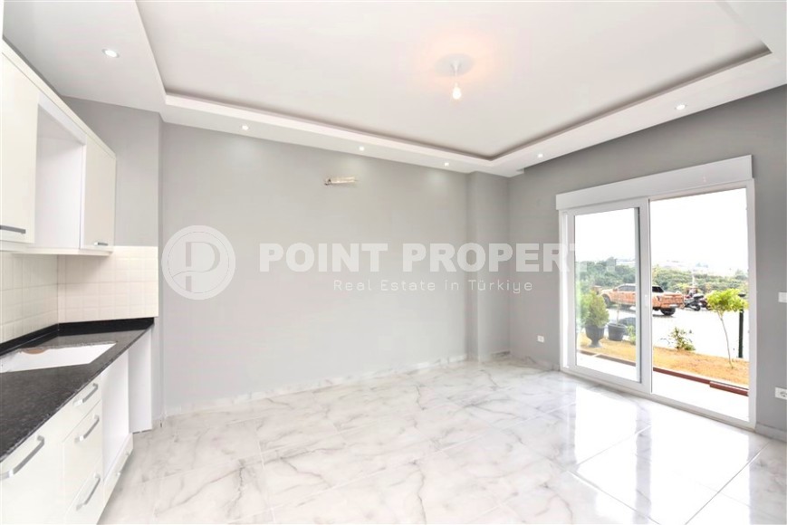 Квартира 1+1 с выходом на просторную лужайку, в перспективном районе Аланьи - Верхняя Оба-id-7692-фото-3