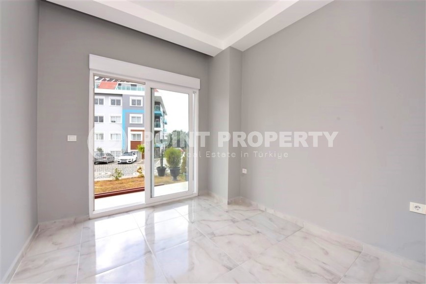 Квартира 1+1 с выходом на просторную лужайку, в перспективном районе Аланьи - Верхняя Оба-id-7692-фото-4