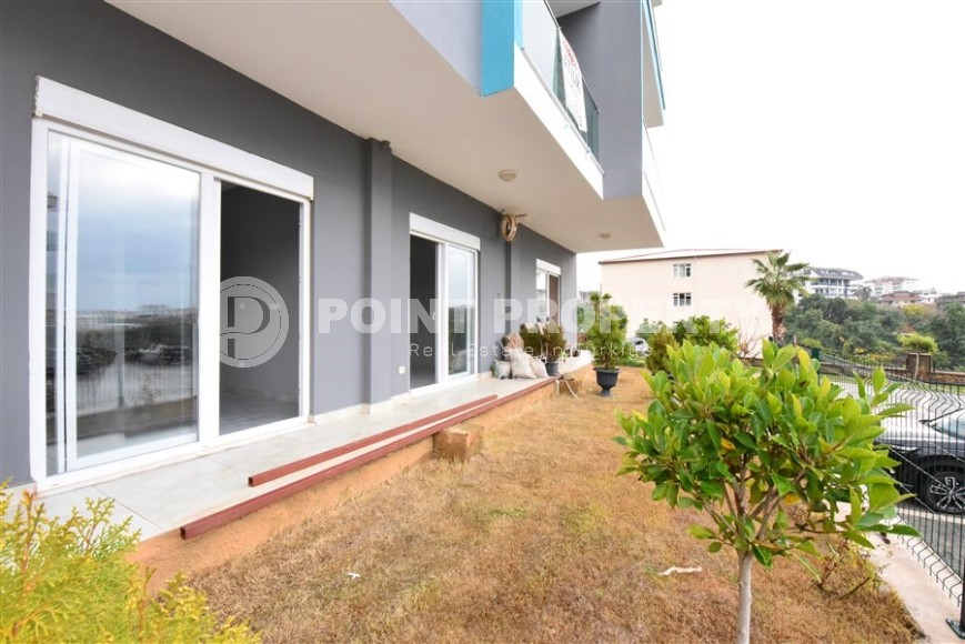 Квартира 1+1 с выходом на просторную лужайку, в перспективном районе Аланьи - Верхняя Оба-id-7692-фото-8