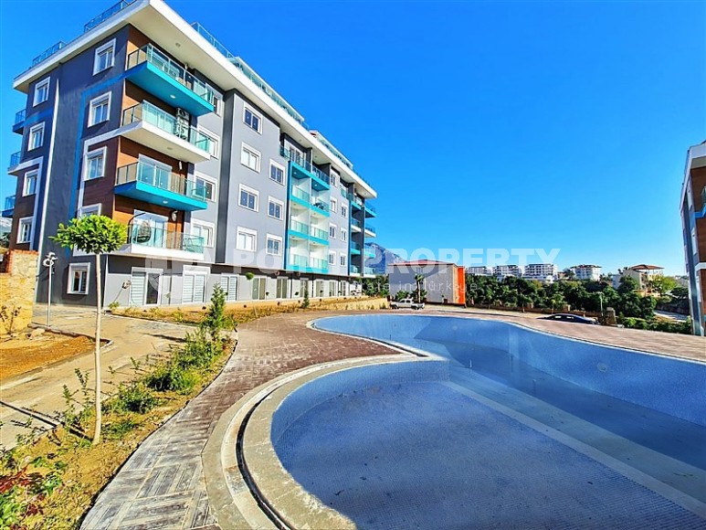 Квартира 1+1 с выходом на просторную лужайку, в перспективном районе Аланьи - Верхняя Оба-id-7692-фото-10