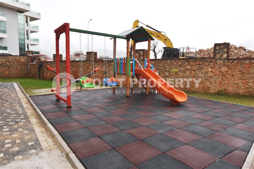 Квартира 1+1 с выходом на просторную лужайку, в перспективном районе Аланьи - Верхняя Оба-id-7692-фото-11