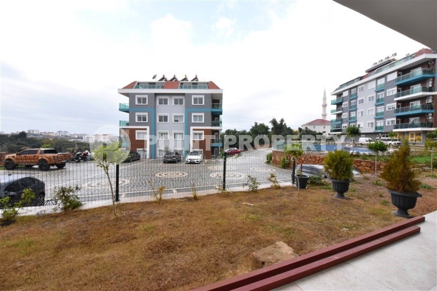 Квартира 1+1 с выходом на просторную лужайку, в перспективном районе Аланьи - Верхняя Оба-id-7692-фото-14