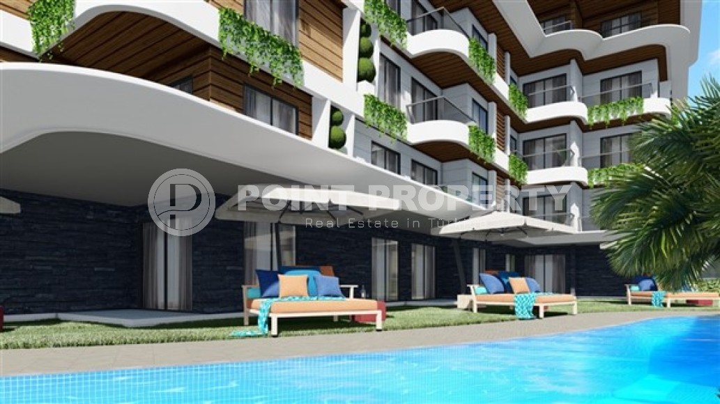 Small 1+1 apartment in a residential complex under construction, in the European region of Alanya - Lower Oba-id-7696-photo-8