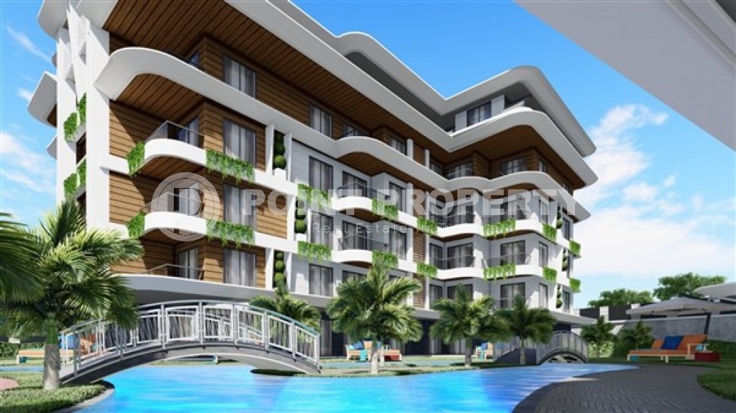 Small 1+1 apartment in a residential complex under construction, in the European region of Alanya - Lower Oba-id-7696-photo-9