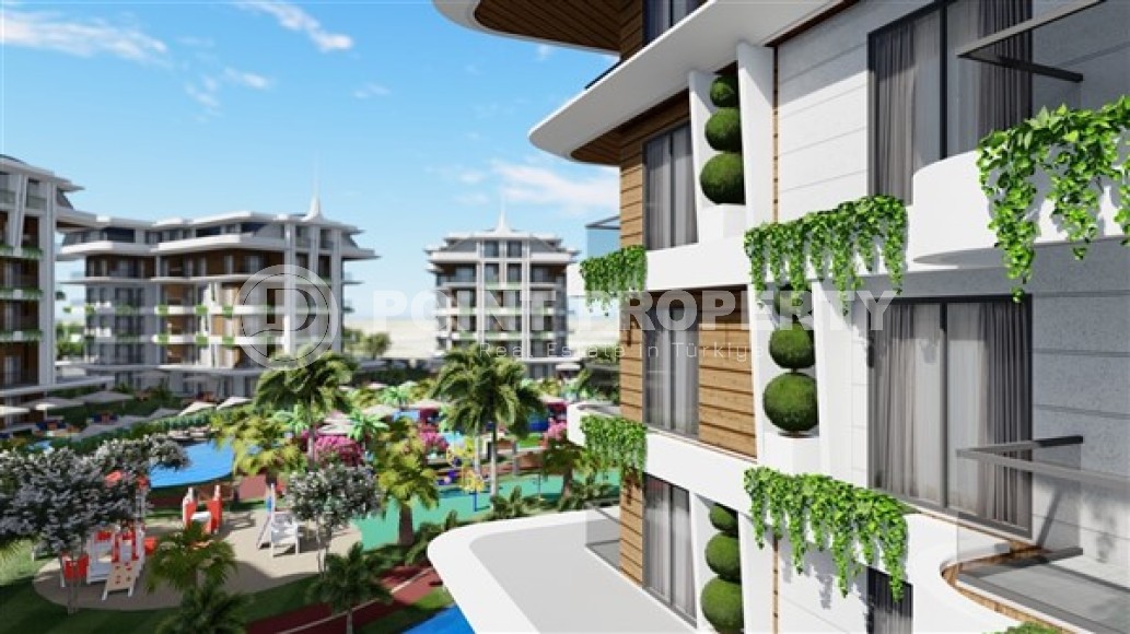 Small 1+1 apartment in a residential complex under construction, in the European region of Alanya - Lower Oba-id-7696-photo-13