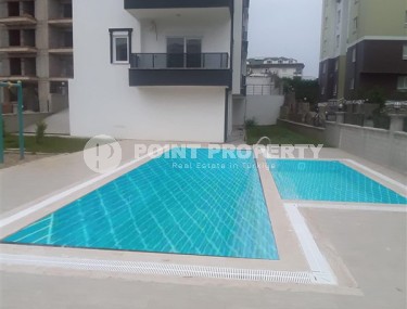 Inexpensive apartment 2+1, with a total area of 80 m2, in a promising area of Alanya - Avsallar-id-7700-photo-1