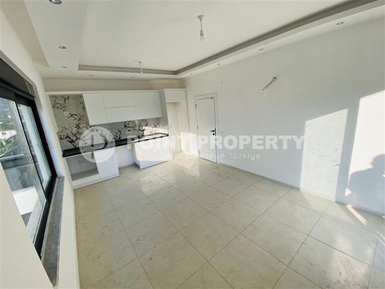 A small new apartment with a fine finish in the center of a prestigious area of Alanya - Kargicak-id-7707-photo-3