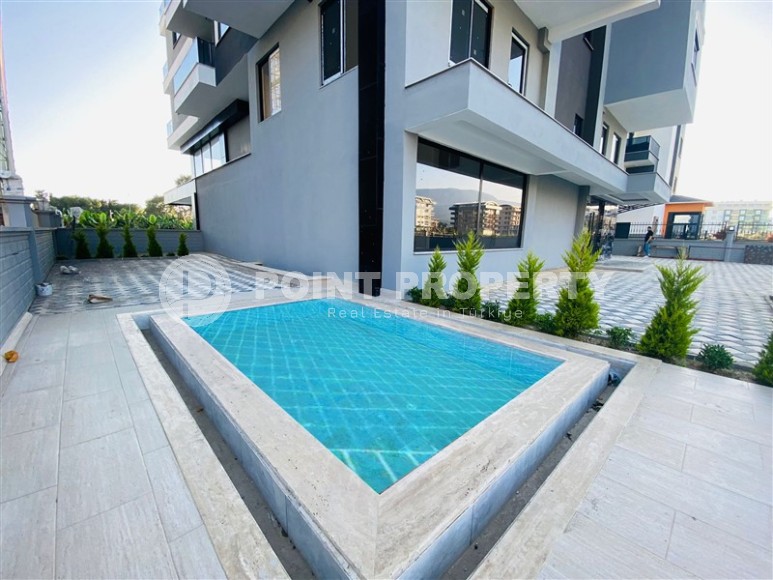 A small new apartment with a fine finish in the center of a prestigious area of Alanya - Kargicak-id-7707-photo-10
