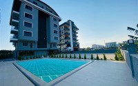 A small new apartment with a fine finish in the center of a prestigious area of Alanya - Kargicak-id-7707-photo-11