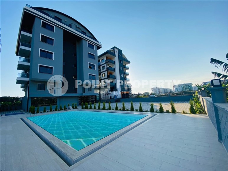 A small new apartment with a fine finish in the center of a prestigious area of Alanya - Kargicak-id-7707-photo-11