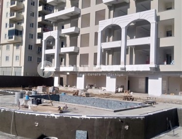 Apartment on the 6th floor in a residential complex under construction, in the resort area of Alanya - Avsallar-id-7710-photo-4