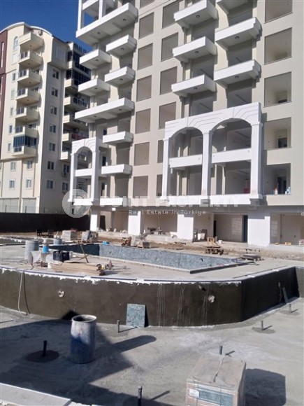 Apartment on the 6th floor in a residential complex under construction, in the resort area of Alanya - Avsallar-id-7710-photo-4