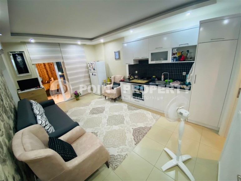 Compact studio 1+0 with a spacious glazed balcony, in the center of the modern area of Alanya - Mahmutlar-id-7713-photo-2