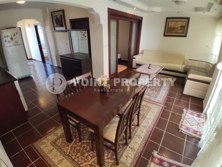 Furnished apartment 2+1 on the first line from the sea, in the center of the popular area of Alanya - Mahmutlar-id-7718-photo-2