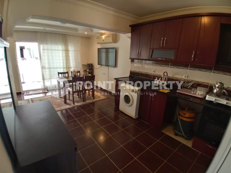 Furnished apartment 2+1 on the first line from the sea, in the center of the popular area of Alanya - Mahmutlar-id-7718-photo-4