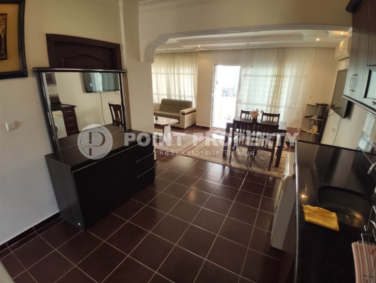 Furnished apartment 2+1 on the first line from the sea, in the center of the popular area of Alanya - Mahmutlar-id-7718-photo-5