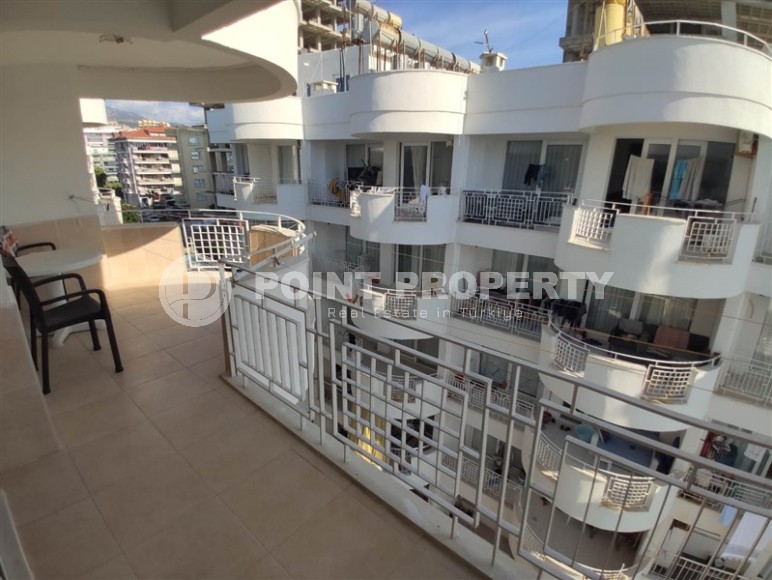 Furnished apartment 2+1 on the first line from the sea, in the center of the popular area of Alanya - Mahmutlar-id-7718-photo-11