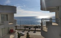 Furnished apartment 2+1 on the first line from the sea, in the center of the popular area of Alanya - Mahmutlar-id-7718-photo-9