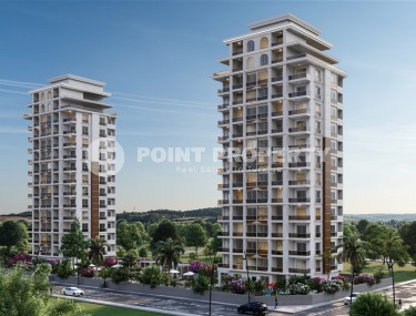 Апартаменты в жилом комплексе на этапе строительства в курортном районе Мерсина - Тедже-id-7719-фото-1