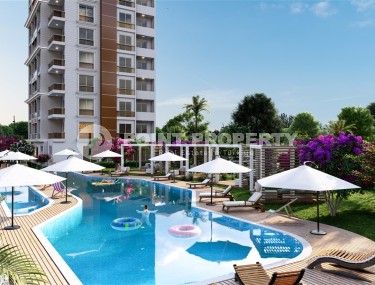 Апартаменты в жилом комплексе на этапе строительства в курортном районе Мерсина - Тедже-id-7719-фото-5