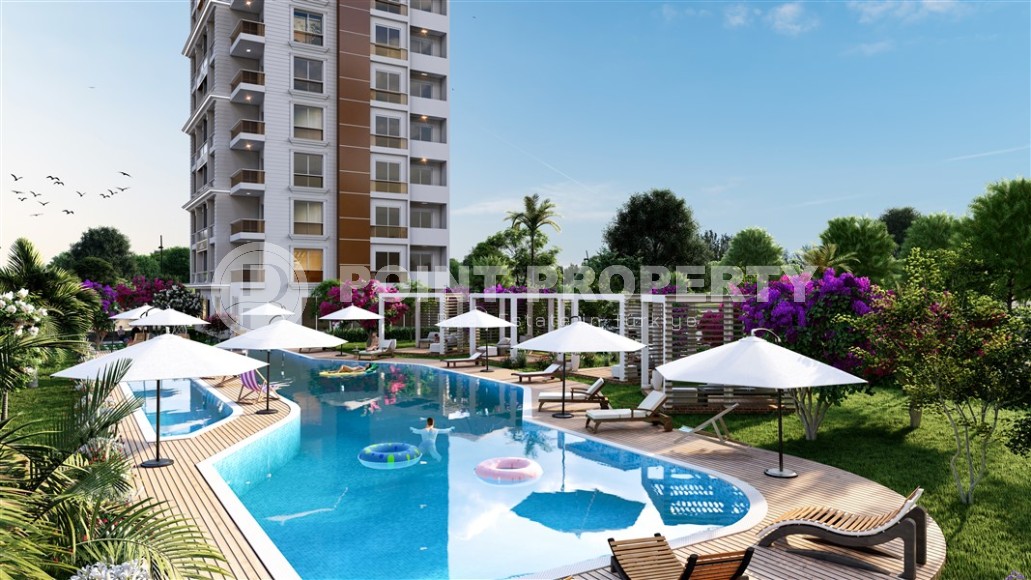 Апартаменты в жилом комплексе на этапе строительства в курортном районе Мерсина - Тедже-id-7719-фото-5